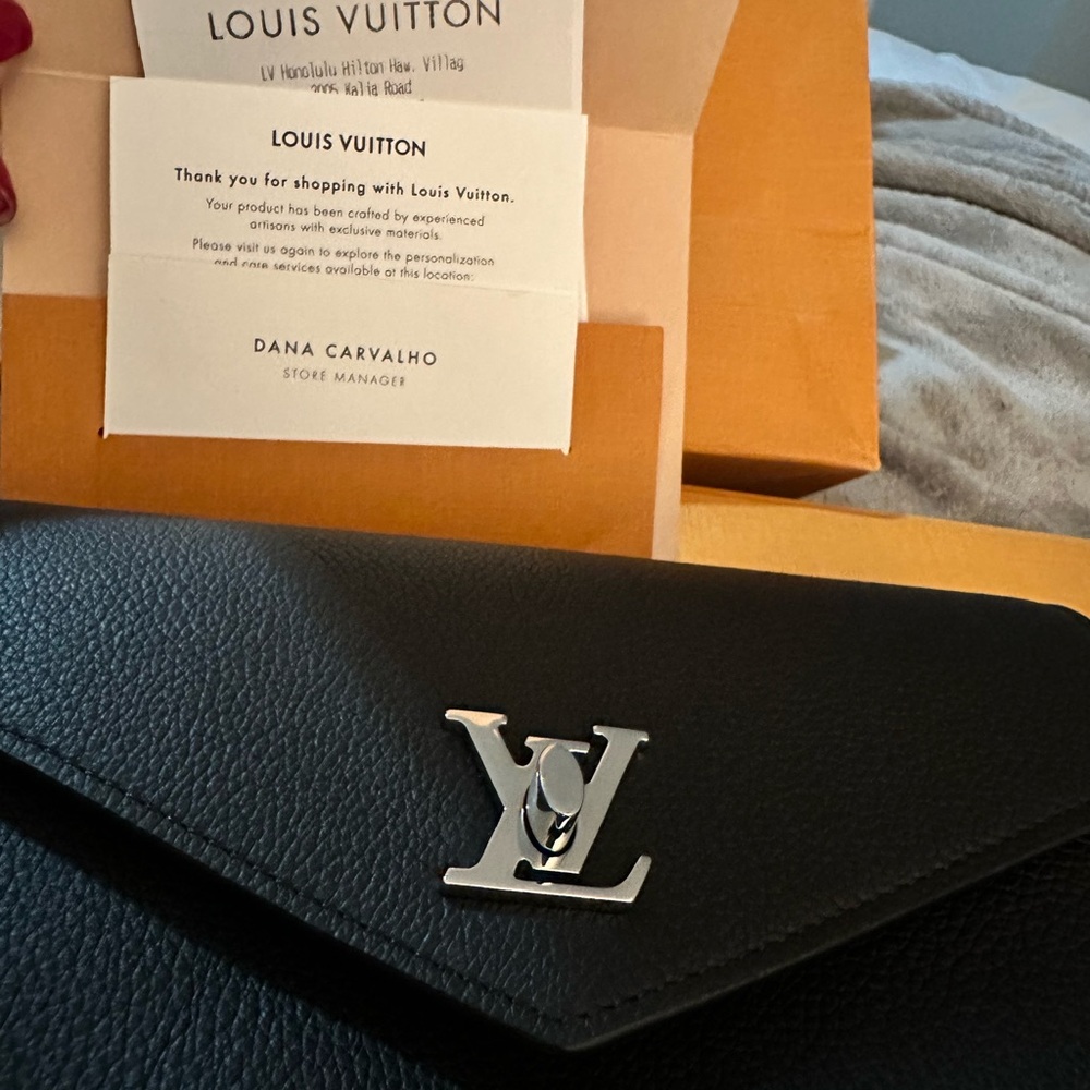 Louis Vuitton Black Wallet with Silver Logo